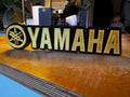 Yamaha 3D Printed Sign – Gold & Black Motorcycle Logo Display – Garage / Man Cave Décor 23cm