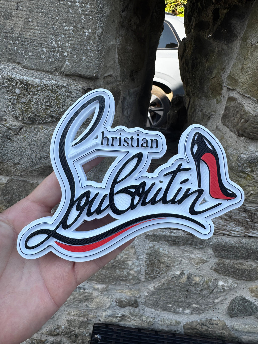 Christian Louboutin 3D Sign