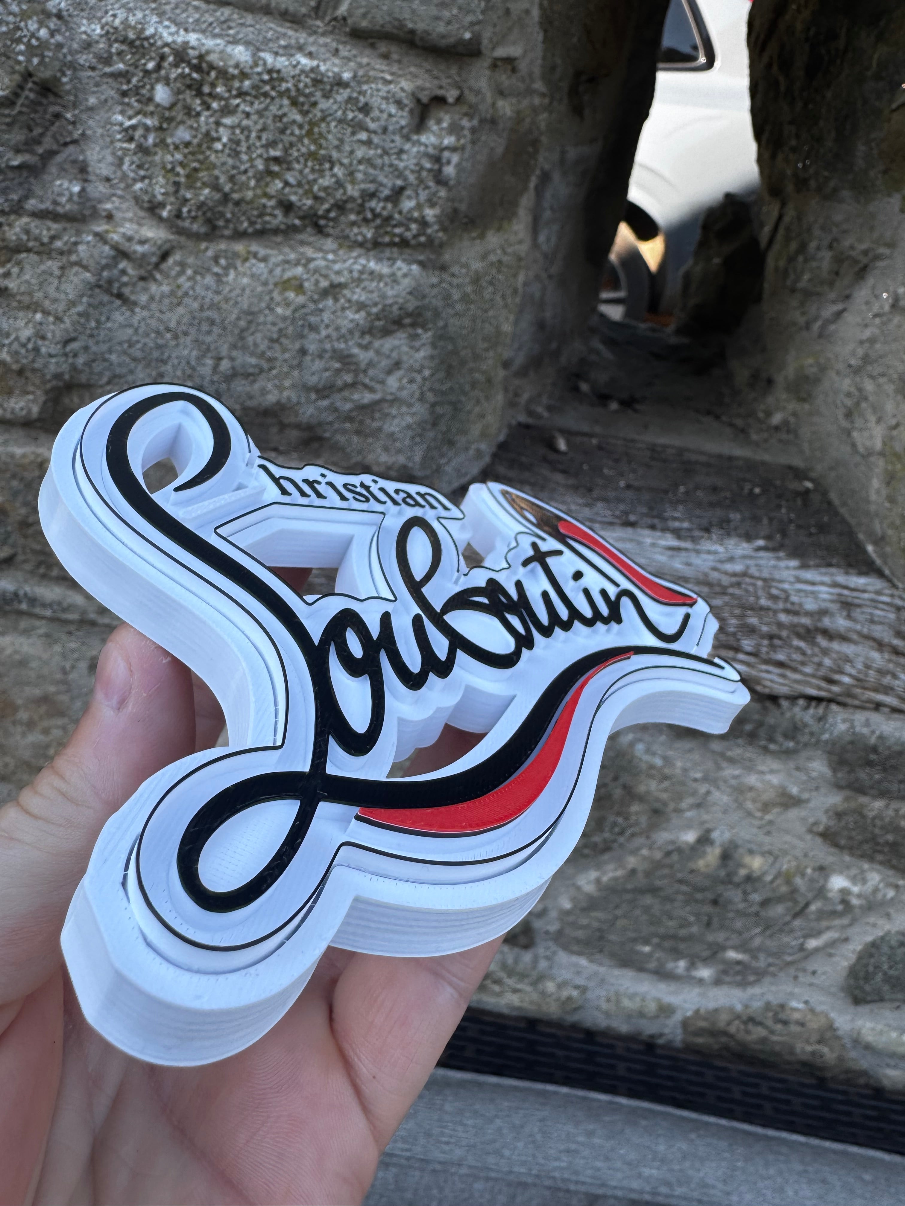 Christian Louboutin 3D Sign